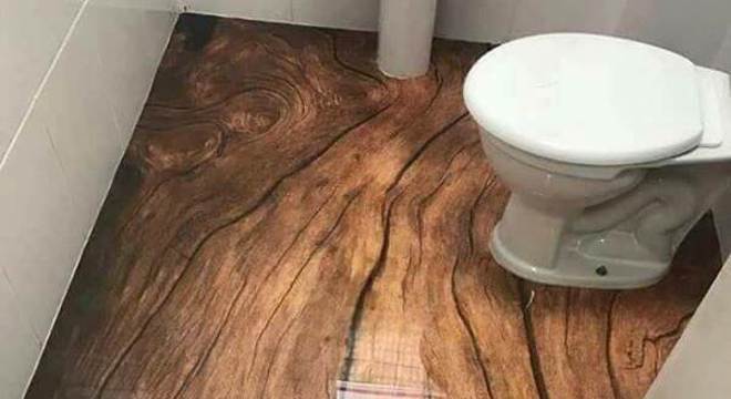 Piso 3D com efeito amadeirado aplicado no banheiro