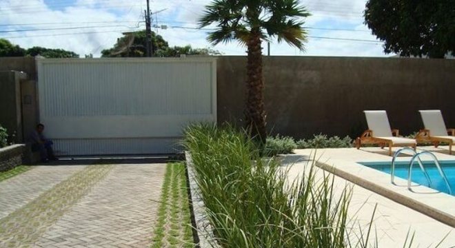 Piso intertravado com grama para o ambiente de garagem