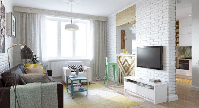 Poltronas para sala de tv em tom branco se harmonizam facilmente com diversos estilos de decoração