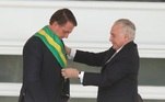 Michel Temer passa a faixa presidencial para Jair Bolsonaro, em 2019