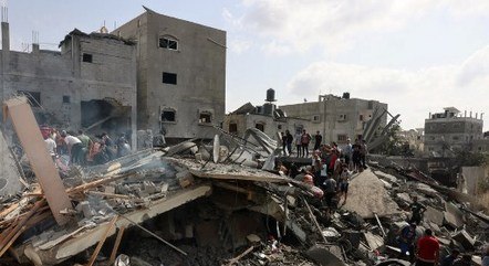 Prédio destruído em Gaza após ataque de Israel