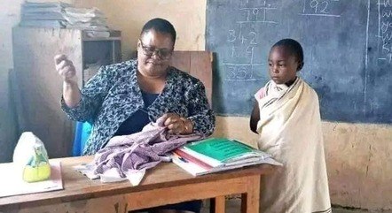 Joyce Sempela Malit costura uniforme da aluna Shirleen Saiton
