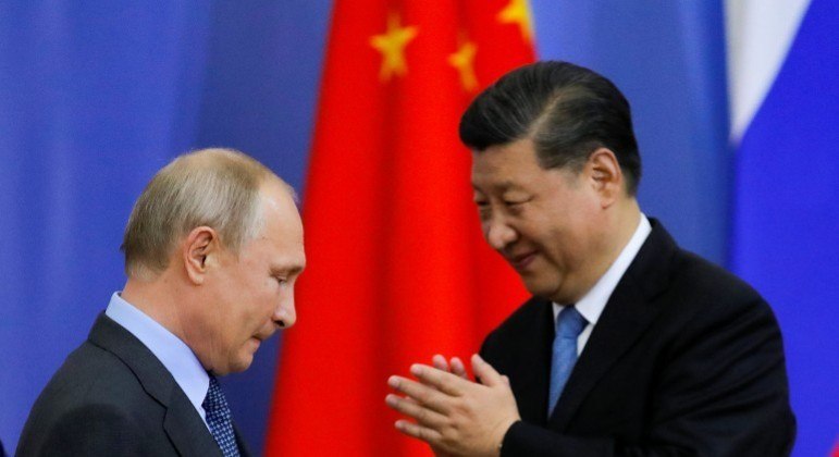 Putin e Xi Jinping durante Fórum Econômico em 2019

