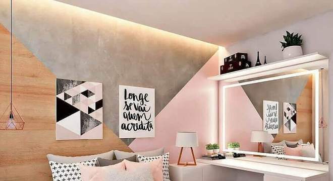 quarto cinza e rosa decorado com revestimento de madeira e penteadeira branca