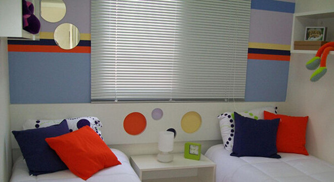 Quarto infantil planejado e duas camas