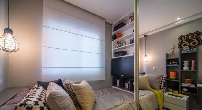 quarto juvenil planejado com guarda roupa espelhado