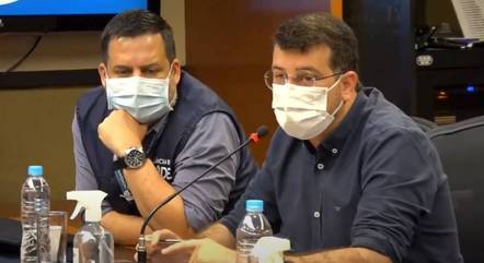 Márcio Garcia e Daniel Soranz durante informe
