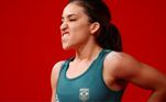 A brasileira Natasha Rosa foi clicada fazendo uma cara inusitada enquanto competia no levantamento de peso