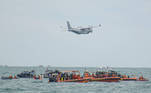 An Indonesian Military aircraft CN-235 is seen during the search and rescue operation for the Sriwijaya Air flight SJ 182, at the sea off the Jakarta coast, Indonesia, January 14, 2021 in this photo taken by Antara Foto. Antara Foto/M Risyal Hidayat/ via REUTERS ATTENTION EDITORS - THIS IMAGE WAS PROVIDED BY A THIRD PARTY. MANDATORY CREDIT. INDONESIA OUT. TPX IMAGES OF THE DAY