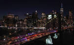 Projections are seen on the Brooklyn Bridge, as part of "A COVID-19 Day of Remembrance" dedicated to the New Yorkers lost during the coronavirus disease (COVID-19) pandemic, in New York City, New York, U.S. March 14, 2021. REUTERS/David 'Dee' Delgado TPX IMAGES OF THE DAY