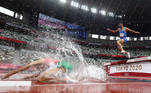Tokyo 2020 Olympics - Athletics - Men's 3000m Steeplechase - Round 1 - OLS - Olympic Stadium, Tokyo, Japan - July 30, 2021. Mohamed Tindouft of Morocco and Ala Zoghlami of Italy in action REUTERS/Kai Pfaffenbach SEARCH 'OLYMPICS DAY 8' FOR TOKYO 2020 OLYMPICS EDITOR'S CHOICE, SEARCH 'REUTERS OLYMPICS TOPIX' FOR ALL EDITOR'S CHOICE PICTURES. TPX IMAGES OF THE DAY