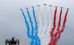 Alpha jets from the French Air Force Patrouille de France fly past Carrousel du Louvre during the Bastille Day celebrations in Paris, France, July 14, 2021. REUTERS/Gonzalo Fuentes TPX IMAGES OF THE DAY