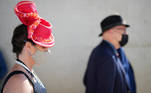 Horse owners walk to the track for the first race at Churchill Downs on the day of the running of 147th Kentucky Derby in Louisville, Kentucky, U.S. May 1, 2021. REUTERS/Bryan Woolston