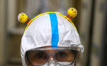 A medical worker wearing an Easter themed headband looks on during her shift at the San Filippo Neri hospital, where patients suffering from the coronavirus disease (COVID-19) are being treated in Rome, Italy, April 4, 2021. REUTERS/Guglielmo Mangiapane