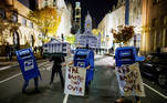 Activists dressed as the White House, Philadelphia City Hall and the United States Postal Service (USPS) mailboxes stand on a street two days after the 2020 U.S. presidential election in Philadelphia, Pennsylvania, U.S. November 5, 2020. REUTERS/Eduardo Munoz