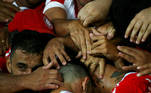 Soccer Football - Copa Libertadores - Third qualifying round - Second Leg - Internacional v Deportes Tolima - Beira Rio Stadium, Porto Alegre, Brazil - February 26, 2020 Internacional's Paolo Guerrero celebrates scoring their first goal with fans and teammates REUTERS/Diego Vara/File Photo TPX IMAGES OF THE DAY SEARCH 'POY SPORTS' FOR THIS STORY. SEARCH 'REUTERS POY' FOR ALL BEST OF 2020 PACKAGES