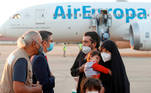 Afghan citizens who were evacuated from Kabul arrive at Torrejon Air Base in Torrejon de Ardoz, outside Madrid, Spain, August 20, 2021. Picture taken August 20, 2021. Mariscal/Pool via REUTERS ATTENTION EDITORS - PARTS OF THE IMAGE HAVE BEEN PIXELATED AT SOURCE