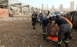 SENSITIVE MATERIAL. THIS IMAGE MAY OFFEND OR DISTURB An injured man who was pinned under a vehicle following an explosion in Beirut's port area, is transported on a stretcher to hospital, in Beirut, Lebanon, August 4, 2020. REUTERS/Mohamed Azakir SEARCH "AZAKIR INJURED VEHICLE" FOR THIS STORY. SEARCH "WIDER IMAGE" FOR ALL STORIES.