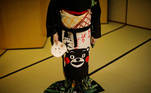 Ikuko, who is a geisha, wears an apron printed with Kumamon, a mascot created by the government of the Kumamoto Prefecture where she was born, before working at a party being hosted by customers, where she will entertain with other geisha at Asada, a luxury restaurant, during the coronavirus disease (COVID-19) outbreak in Tokyo, Japan, June 23, 2020. REUTERS/Kim Kyung-Hoon SEARCH "GEISHA COVID-19" FOR THIS STORY. SEARCH "WIDER IMAGE" FOR ALL STORIES.