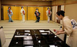 Koiku, Maki, Ikuko and Mayu, who are geisha, perform a dance routine for Reuters, before they work at a party being hosted by customers at Asada, a luxury Japanese restaurant, during the coronavirus disease (COVID-19) outbreak in Tokyo, Japan, June 23, 2020. REUTERS/Kim Kyung-Hoon SEARCH "GEISHA COVID-19" FOR THIS STORY. SEARCH "WIDER IMAGE" FOR ALL STORIES.