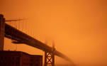 Orange sky is seen over the Golden Gate bridge in San Francisco, California U.S. September 9, 2020 in this picture obtained from social media. Picture taken September 9, 2020. Chris Ceg/via REUTERS THIS IMAGE HAS BEEN SUPPLIED BY A THIRD PARTY. MANDATORY CREDIT. NO RESALES. NO ARCHIVES. TPX IMAGES OF THE DAY