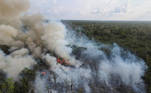 Billows of smoke rise over a deforested plot of the Amazon jungle next to the Transamazonica national highway, in Labrea, Amazonas state, Brazil, September 1, 2021. Picture taken September 1, 2021 with a drone. REUTERS/Bruno Kelly