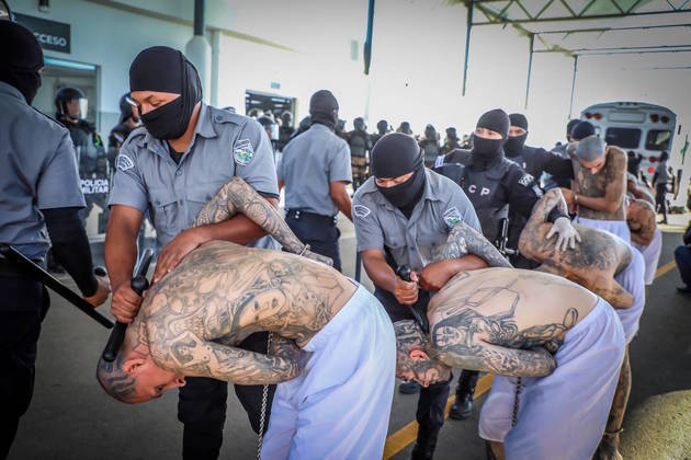 1 - Gang members wait to be taken to their cells after 2000 gang members were transferred to the Terrorism Confinement Center, according to El Salvador's President Nayib Bukele, in Tecoluca, El Salvador, in this handout distributed to Reuters on February 24, 2023. 