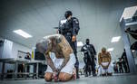 1 - Gang members wait to be taken to their cells after 2000 gang members were transferred to the Terrorism Confinement Center, according to El Salvador's President Nayib Bukele, in Tecoluca, El Salvador, in this handout distributed to Reuters on February 24, 2023. 