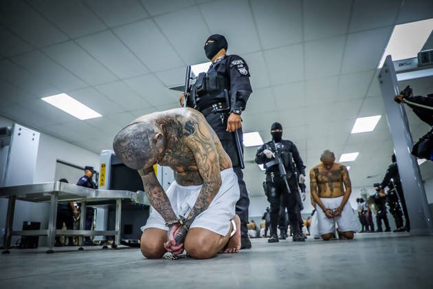 1 - Gang members wait to be taken to their cells after 2000 gang members were transferred to the Terrorism Confinement Center, according to El Salvador's President Nayib Bukele, in Tecoluca, El Salvador, in this handout distributed to Reuters on February 24, 2023. 