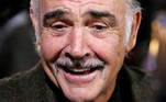 FILE PHOTO: British actor Sean Connery smiles as he arrives on the red carpet for the European film award ceremony in Berlin, December 3, 2005. REUTERS/Fabrizio Bensch/File Photo