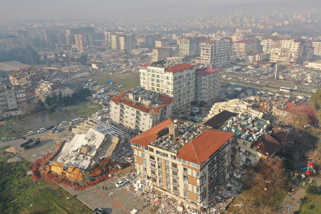 An aerial view shows collapsed and damaged buildings after an earthquake in Hatay, Turkey February 7, 2023. REUTERS/Umit Bektas