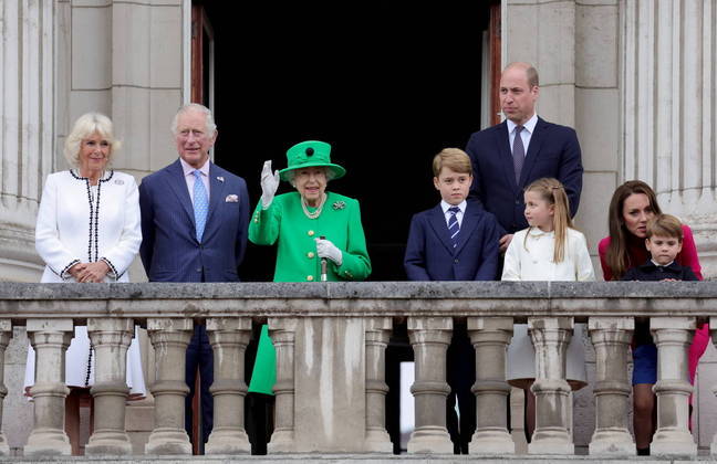 FILE PHOTO: Camilla, Duchess of Cornwall, Prince Charles, Queen Elizabeth, Prince George, Prince William, Princess Charlotte, Prince Louis and Catherine, Duchess of Cambridge stand on the balcony during the Platinum Pageant, marking the end of the celebrations for the Platinum Jubilee of Britain's Queen Elizabeth, in London, Britain, June 5, 2022. Chris Jackson/Pool via REUTERS/File Photo