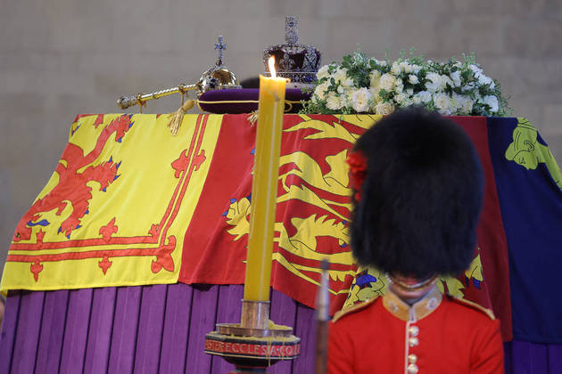 A royal guard stands next to the coffin of Britain's Queen Elizabeth inside Westminster Hall, following her death, in London, Britain, September 17, 2022. REUTERS/Marko Djurica/Pool