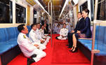 Thailand's King Maha Vajiralongkorn and Queen Suthida ride on an MRT during an inauguration of a new subway station in Bangkok, Thailand, November 14, 2020. Picture taken November 14, 2020. Royal Household Bureau/Handout via REUTERS ATTENTION EDITORS - THIS IMAGE WAS PROVIDED BY A THIRD PARTY. NO RESALES. NO ARCHIVE.