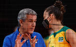 Tokyo 2020 Olympics - Volleyball - Women's Semifinal - Brazil v South Korea - Ariake Arena, Tokyo, Japan – August 6, 2021. Brazil coach Jose Roberto Guimaraes speaks with Macris of Brazil. REUTERS/Valentyn Ogirenko