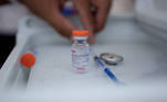 A health worker prepares a dose of Sinovac's CoronaVac coronavirus disease (COVID-19) vaccine, during a mass vaccination program in Apodaca, on the outskirts of Monterrey, Mexico May 25, 2021. REUTERS/Daniel Becerril