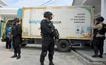ATTENTION EDITORS - CAPTION CORRECTION FOR RC2F1L9LYIW2. WE ARE SORRY FOR ANY INCONVENIENCE CAUSED. REUTERS. REFILE - CORRECTING BYLINE Armed police officers stand guard next to a truck containing Sinovac's vaccine for coronavirus disease (COVID-19) during its distribution in Pekanbaru, Riau province, Indonesia, January 5, 2021 in this photo taken by Antara Foto. Antara Foto/FB Anggoro via REUTERS ATTENTION EDITORS - THIS IMAGE WAS PROVIDED BY A THIRD PARTY. MANDATORY CREDIT. INDONESIA OUT. TEMPLATE OUT