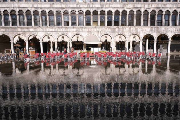 General view of a bar at the flooded St. Mark's Square during seasonally high water in Venice, Italy November 5, 2021. REUTERS/Manuel Silvestri