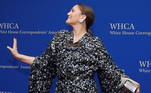 Actor Drew Barrymore poses as she arrives on the red carpet for the annual White House Correspondents' Association Dinner in Washington, U.S., April 30, 2022. REUTERS/Tom Brenner