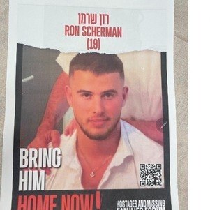 Poster exibe foto de Ron Scherman