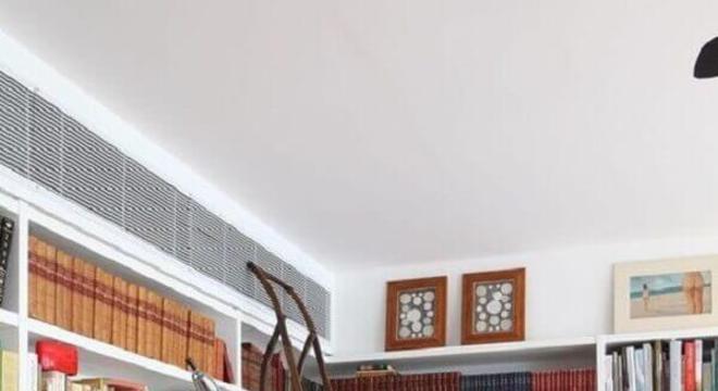 sala planejada com estante para livros