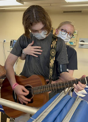 Sammy durante a musicoterapia