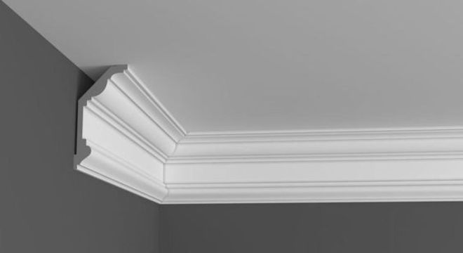 sanca de isopor - moldura sendo instalada 