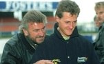 ARCHIVO - ANUNCIO RETIRADA MICHAEL SCHUMACHER :SCH01 SILVERSTONE (REINO UNIDO), 10.09.06.- Foto de archivo, tomada en abril de 1992, que muestra al piloto alemán de Fórmula Uno Michael Schumacher (d), junto a su representante, Willi Weber, en el circuito de Silverstone, Reino Unido. Schumacher anunció hoy domingo 10 de septiembre su retirada de la competición al término de esta temporada. EFE/Oliver Multhaup/Archivo

