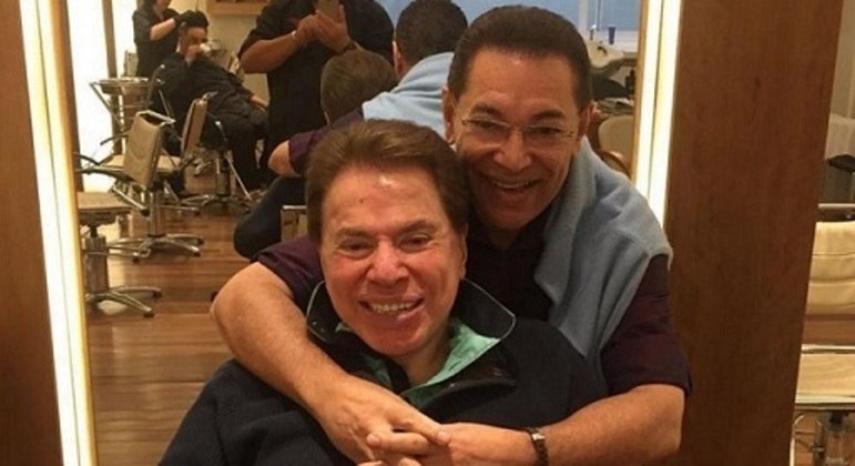 Ausência de Silvio Santos, na foto ao lado do amigo e cabeleireiro Jassa, fez o SBT parar