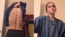 Jovem revela tatuagem gigantesca nas costas com nome do ex