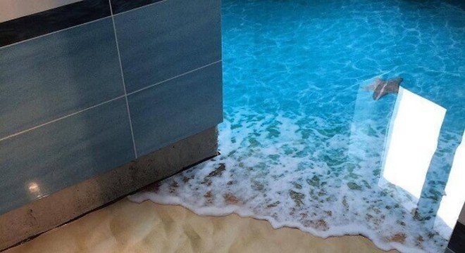 Tenha uma praia dentro de casa utilizando o piso 3D