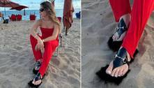 Thyane Dantas divide opiniões ao usar sandália 'peluda' na praia: 'Parece um bicho no pé'