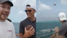 Tom Brady é desafiado e acerta drone com bola de futebol americano no mar; assista ao vídeo