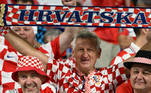 Torcedor da Croácia leva faixa com o nome do país para apoiar a seleção contra o Canadá
